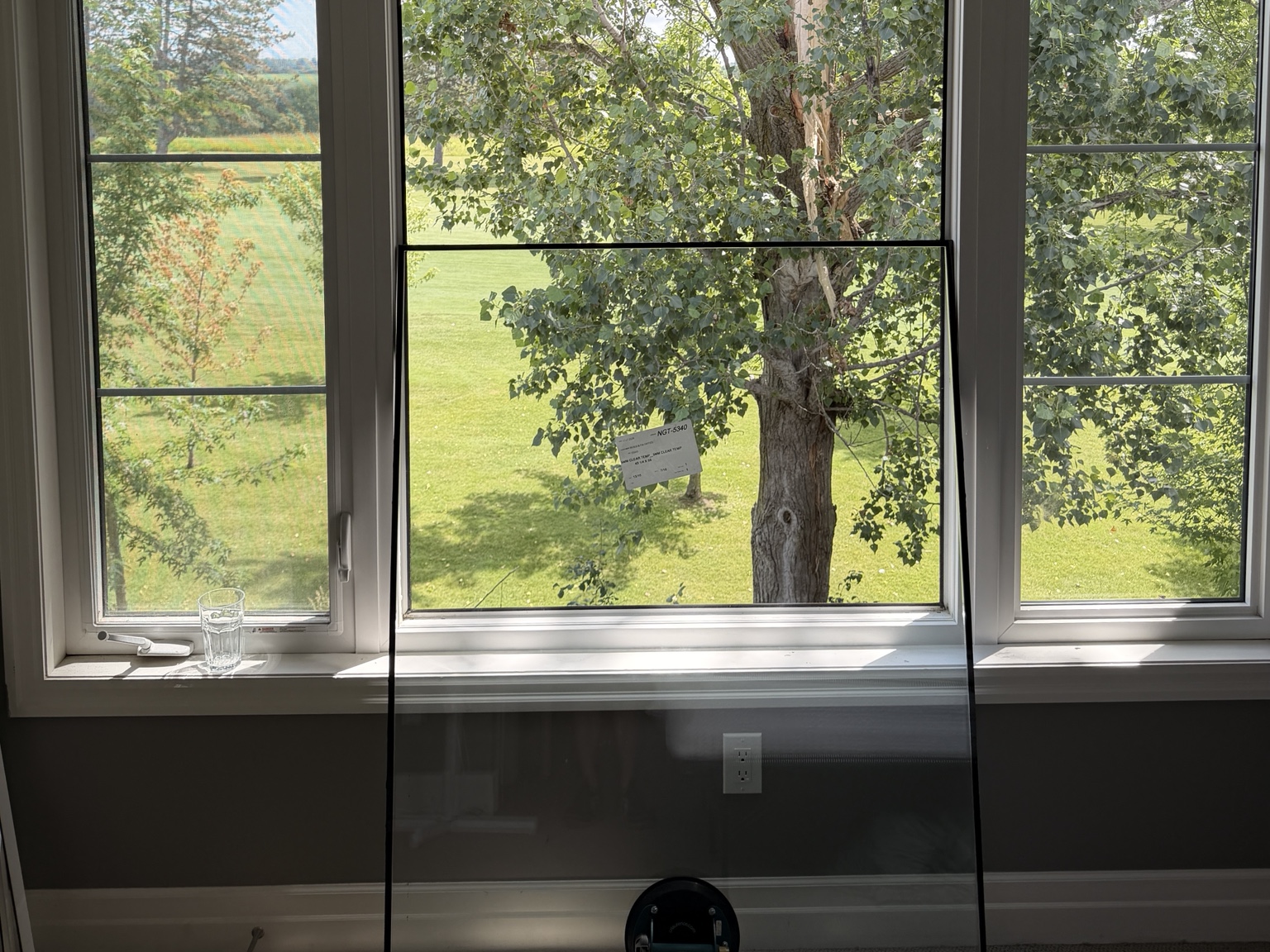 Oshawa house window cleared and replacement glass ready