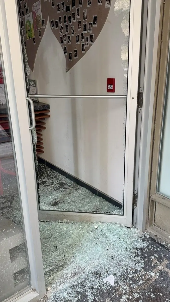 Broken glass detail at the Toronto commercial entrance